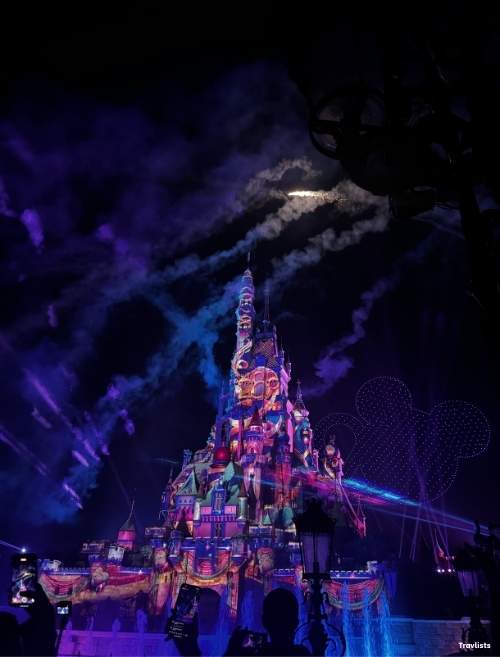 Hong Kong Disneyland castle night show with laser and drone display
