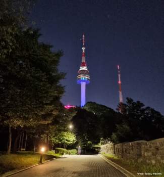 N Seoul Tower viewed at night from Namsan Park